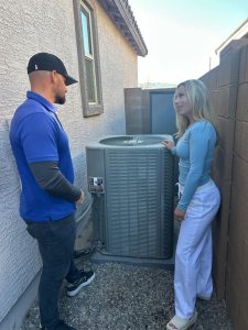 talking with a customer for heat pump replacement with rebate in vancouver